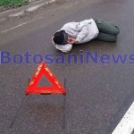 barbat intins pe strada cu indicator la cap - Darabani- Botosani