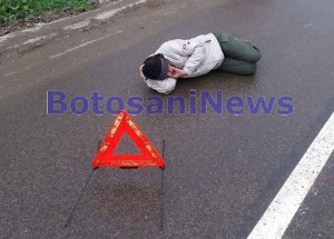 barbat intins pe strada cu indicator la cap - Darabani- Botosani